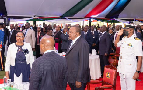 President Uhuru Kenyatta and Deputy President William Ruto seated at separate tables during the National Prayer Breakfast on May 26, 2022.