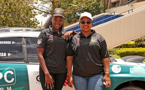 Faith Milkah with her navigator Hellen Nasieku posing infront of their car ahead of the Sunday March 27, 2022 Safari rally