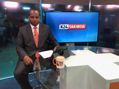 Former K24 TV anchor Franklin Wambugu while in studio.
