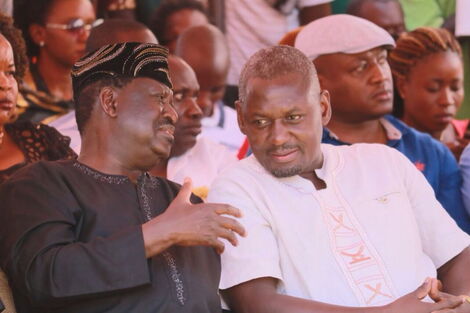 Former Prime Minister Raila Odinga (left) and Rarieda MP Otiende Amollo at a past event.