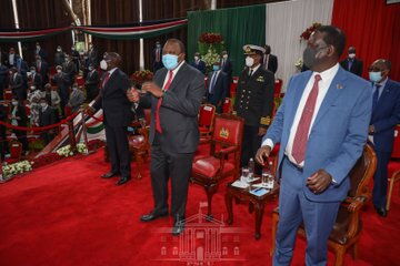 Former Prime Minister Raila Odinga (right), President Uhuru Kenyatta (center) and Deputy President William Ruto at Bomas of Kenya on Monday, October 26, 2020.