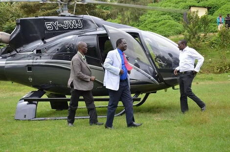 Former Prime Minister Raila Odinga stepping out of Jimmy Wanjigi's Eurocopter.