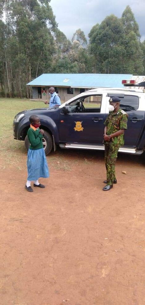 Kisii Police Boss Francis Kooli with a Viral Girl Reading while Herding Cows on September 19
