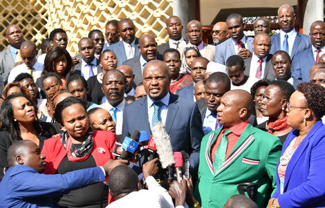 Gatundu South MP Moses Kuria speaking during a press briefing by Ruto-allied MPs on Wednesday, March 11 at parliament.