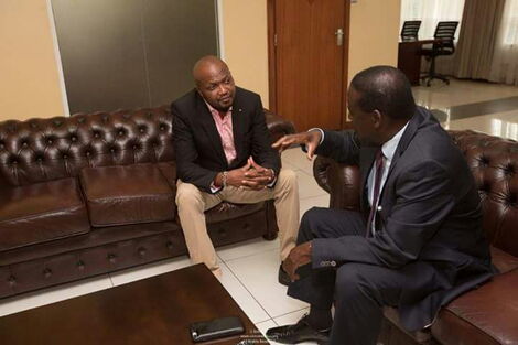 Gatundu South MP Moses Kuria with Opposition leader Raila Odinga at the ODM leader's Capitol Hill office in Nairobi on March 26, 2018.