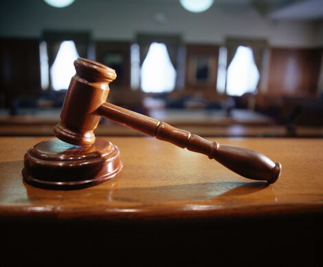 Undated file image of a gavel on the bench in the courtroom