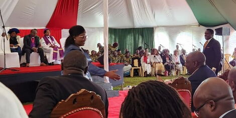 Governor Kawira Mwangaza shakes hand with President William Ruto during an interdenominational service in Meru County on Sunday, December 4, 2022