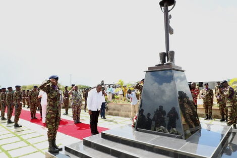 H. E. President Uhuru Kenyatta bows in respect after laying a wreath at Modika Barracks Heroes Monument during the barrack’s inauguration ceremony on Friday 13 December 2019.