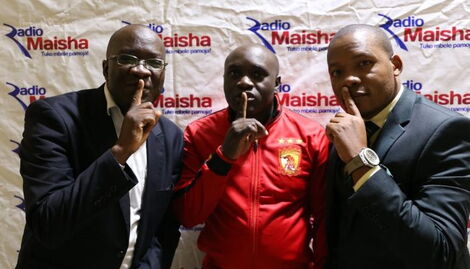 From left to right: journalists Ali Kauleni, Stephen Mukangai and Hassan Juma posing for a photo. 