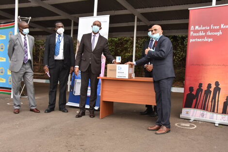 Health CAS Rashid Aman (Second from Right) receiving the medical donation from a Fosun Pharma representative outside Afya House on August 25, 2020..