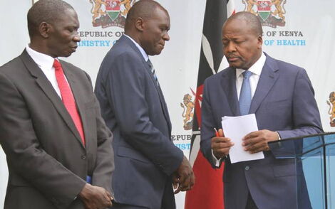 Government Spokesman Cyrus Oguna (left), Acting Ministry of Health Director-General Patrick Amoth (centre) and Health CS Mutahi Kagwe (right) during a press conference at the ministry’s headquarters in Nairobi on March 30, 2020.