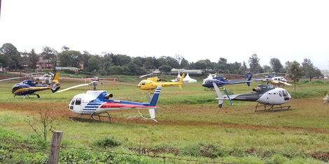 Helicopters belonging to politicians at Dedan Kimathi University during the 2017 Madaraka Day celebrations.