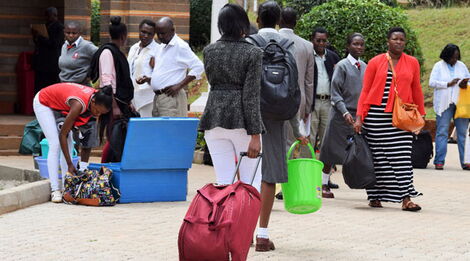 High School students report to school accompanied by their parents in January 2018.