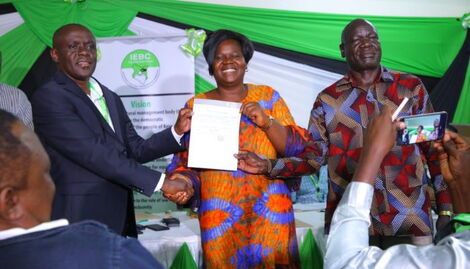 Homa Bay Governor-elect Gladys Wanga receives his certificate after winning the gubernatorial election on August 12, 2022