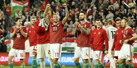 Hungarian players celebrate after beating Croatia