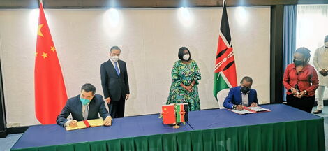 ICT CS Joe Mucheru signing a deal with China high level representative in presence of CS Raychelle Omamo on Thursday January 6, 2022