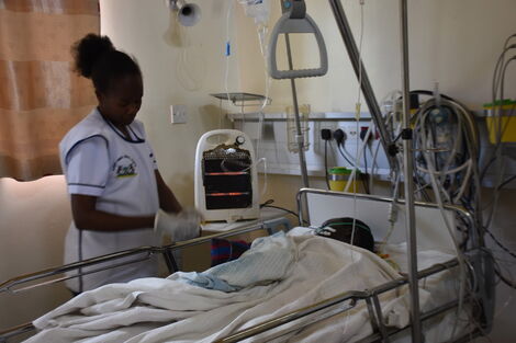 A nurse attends to a patient at an ICU ward at the Moi Teaching and Referral Hospital in Eldoret, Uasin Gishu County in January 2020