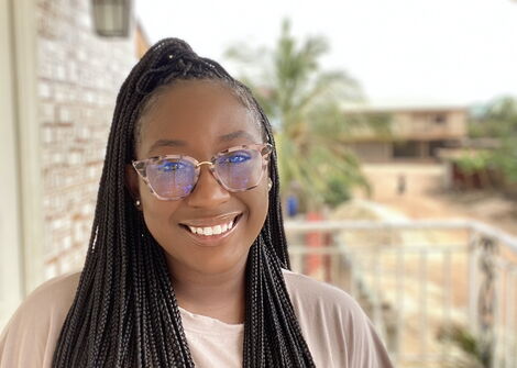 American tutor Brittney Caldwell posing for a photo.