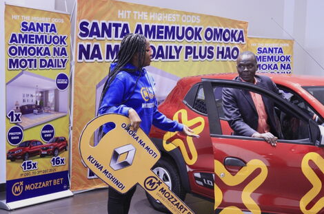 Winner of Mozzartbet's Omoka na Moti car promotion getting into his brand new car on December 6, 2021.