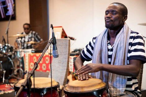 Otieno Wakeke performing at a traditional music festival 