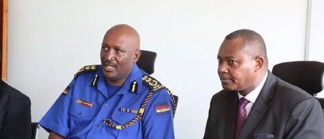 The former Inspector General of Police, Hilary Mutyambai (left) and, the former DCI boss, George Kinoti.