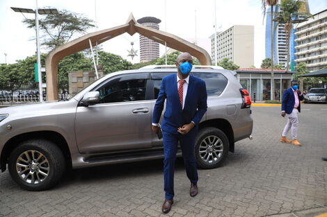 Murang'a Senator Irungu Kang'ata being dropped by a government-issued car in Parliament 