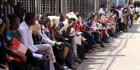 Job seekers wait to hand in their documents during recruitment at County Hall in Nairobi, 2019.