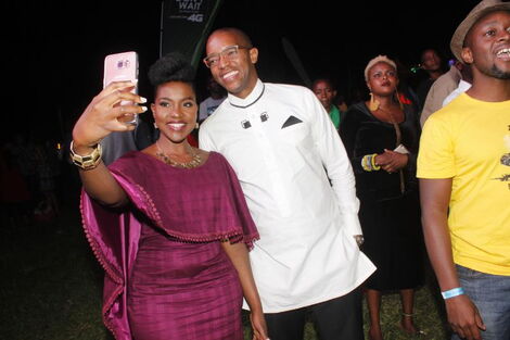 Switch TV Joyce Omondi (left) and husband Waihiga Mwaura take a selfie at an event.