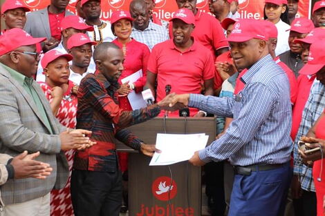 Jubilee Party officials handing over party tickets to aspirants in Taita Taveta County on Saturday April 16, 2022