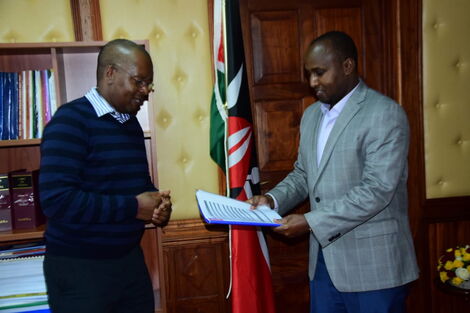 An image of Kimunya and Junet 