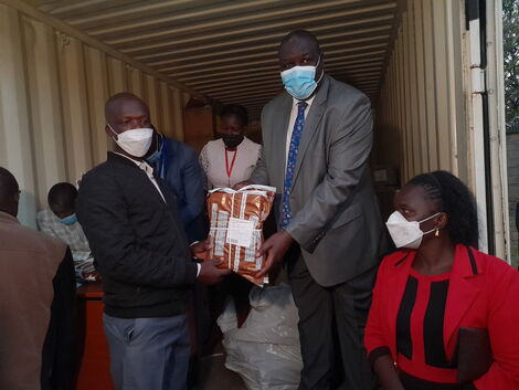 Education PS Julius Jwan overseeing the distribution of KCPE exam papers in Homabay County on Monday, March 7.