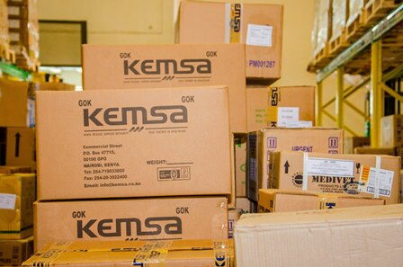 KEMSA branded boxes.