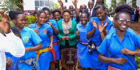 Health CS Susan Nakhumicha being entertained by KMTC students. 17.11.2022.