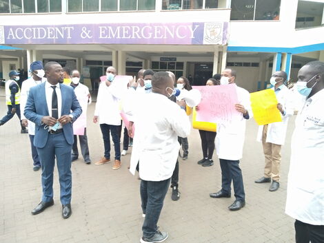 Kenya Medical Practitioners, Pharmacists & Dentists Union secretary-general, Dr. Davji Bhimji, (extreme left) getting ready to address the media on August 25, 2021.