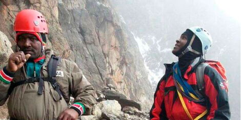 File photo of James Kagambi (right) with Evans Mwiti at the base of Point Batian on top of Mt Kenya