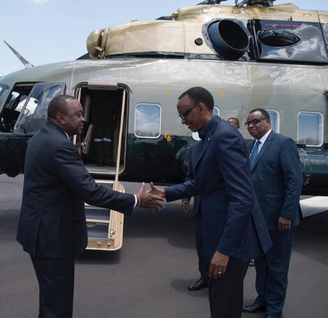 Rwandan President Paul Kagame bids goodbye to President Uhuru Kenyatta who was attending a conference in Kigali, Rwanda on March 11, 2019