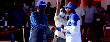 ODM party leader Raila Odinga and Wiper's Kalonzo Musyoka shake hands after Kalonzo endorsed him for the presidency at Jacaranda Grounds on Saturday, March 12, 2022