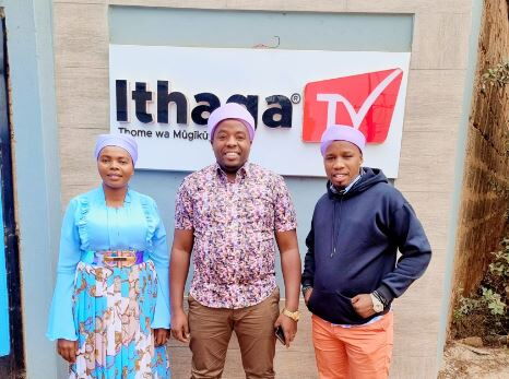 Kikuyu musician, Karangu Muraya and his friends pose for a photo outside Ithaga TV station offices on September 14, 2022.