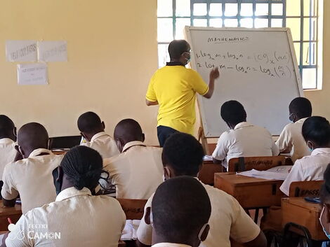 Interior PS Karanja Kibicho teaching Mathematics at St Peter's Secondary Gathuthiini on March 1, 2021