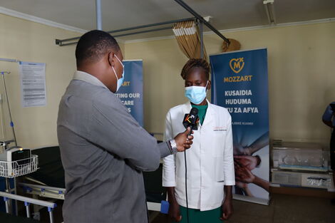 Kayole 1 Health Centre in Charge, Mrs Erica Ndege, talks after receiving the donation from Mozzart.