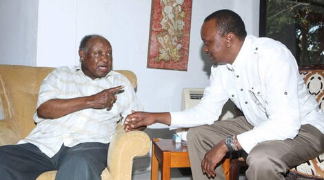 Kenneth Stanley Njindo Matiba (Left) and President Uhuru Kenyatta.