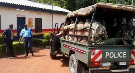 Kenya Police officers pictured outside a police station. A naked man stormed the Embakasi police station on Saturday night, June 13, 2020.