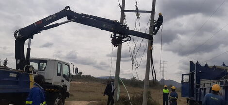 Kenya Power staff working on electricity lines at Soysambu Conservancy on February 22, 2021