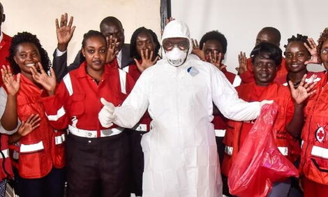 Kenya Red Cross paramedics and volunteers at the Nakuru County Level 5 Hospital during a training exercise on the proper use of Personal Protective Equipment (PPEs) in light of the Covid-19 pandemic on Sunday, March 15, 2020.