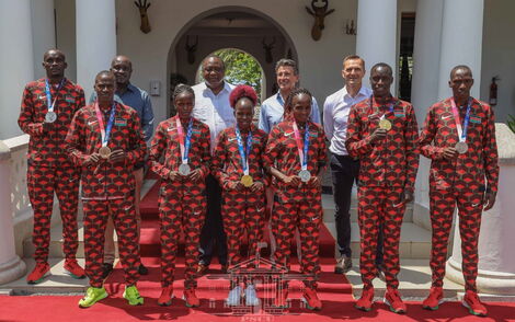 Kenyan Athletes Pose For A Photo With President Uhuru Kenyatta at State House on August 16, 2021.