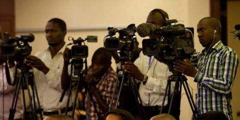 Kenyan journalists covering a live conference..jpg