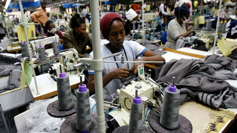 File photo of people working in a textile factory