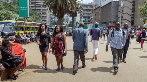 File image of Kenyans pictured walking in the capital, Nairobi