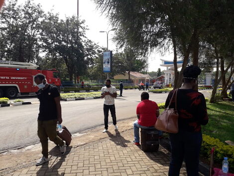 Kenyans quarantined at Kenyatta University protest against the government on Wednesday, April 15, 2020