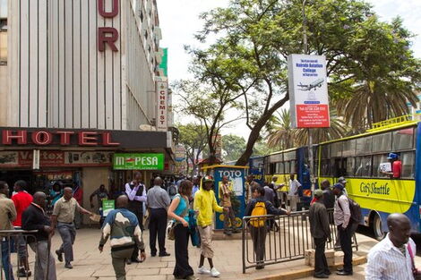Kenyans walking on busy Nairobi streets